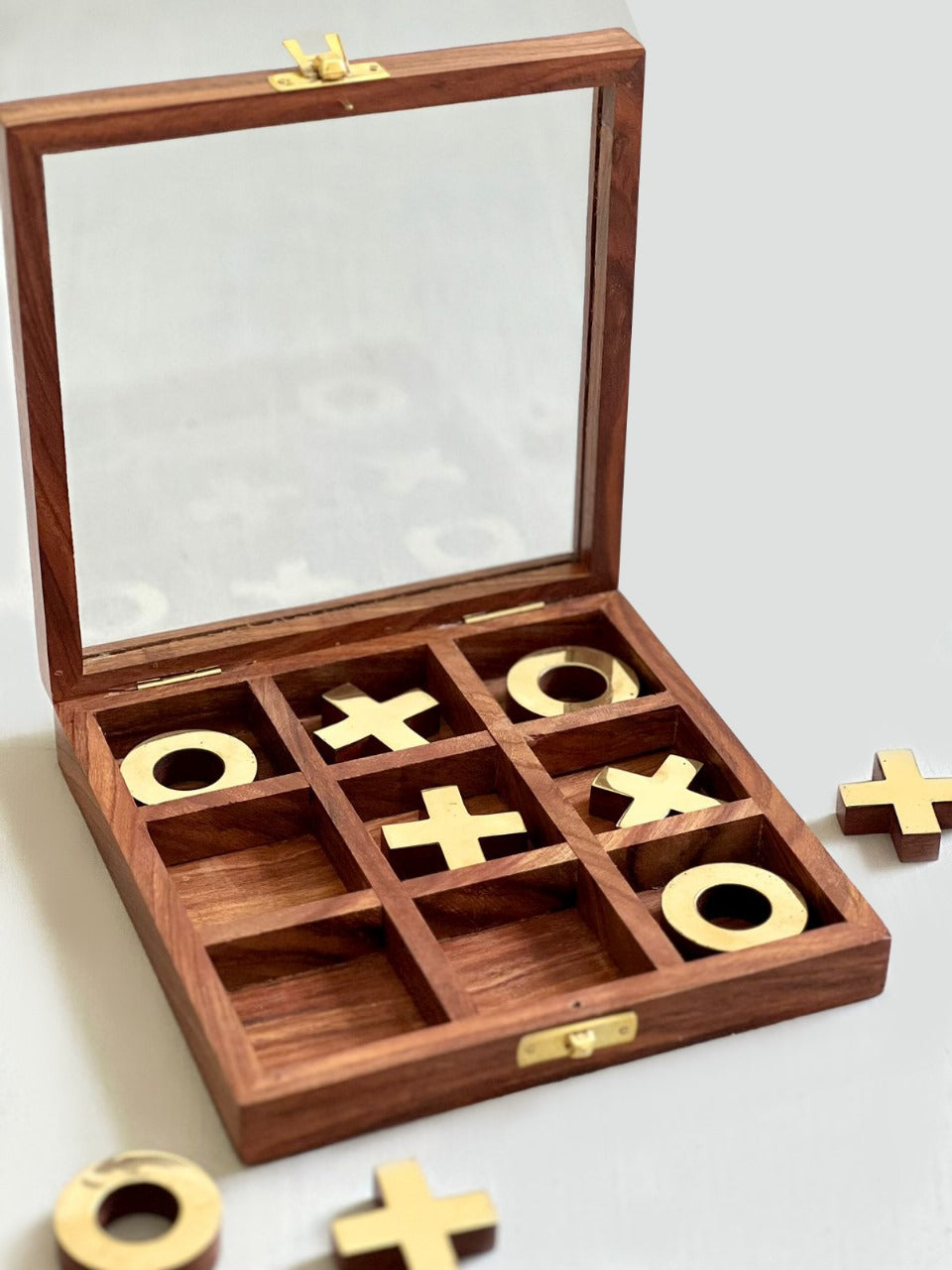 wooden tic tac toe with brass finishing